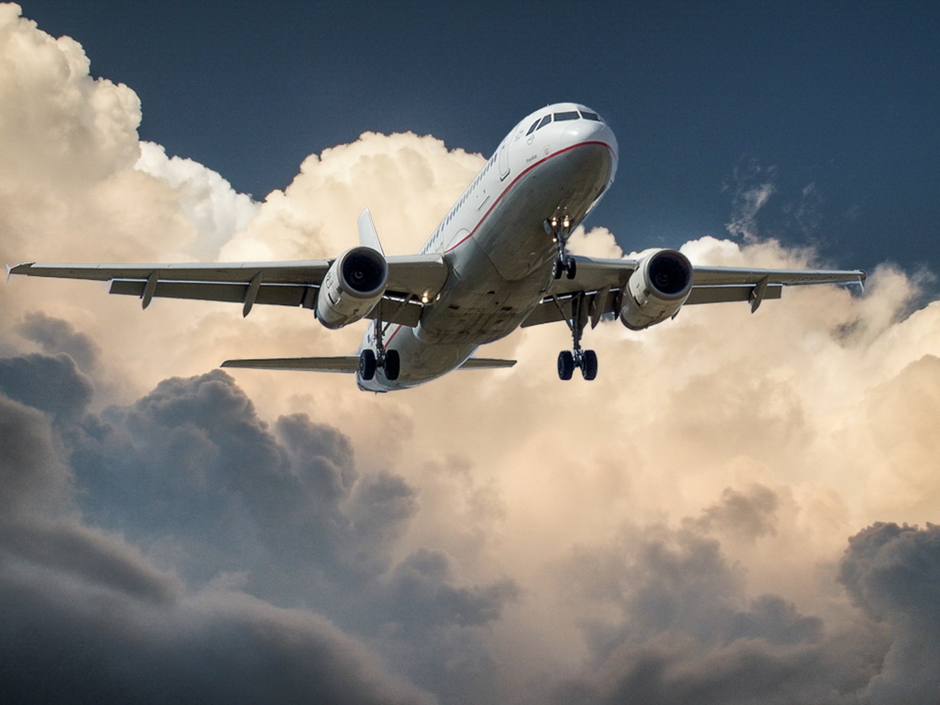 Airplane among clouds