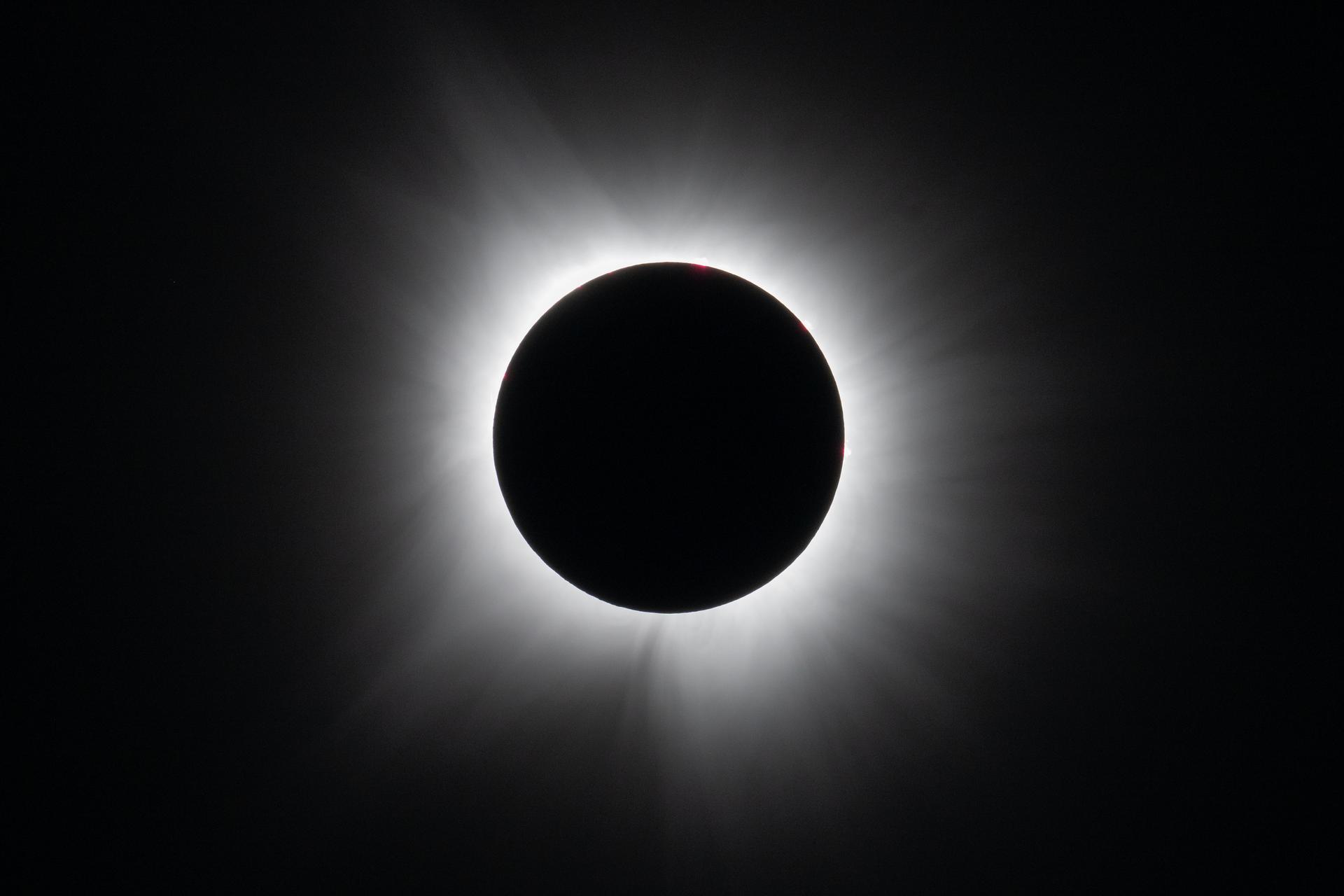 The solar corona surrounding the black disc of the Moon during a total solar eclipse